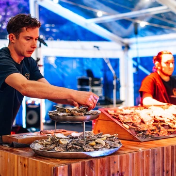 Live oyster shucking