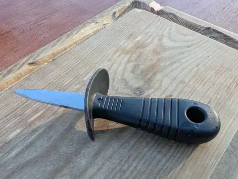 Plastic handle oyster shucking tool